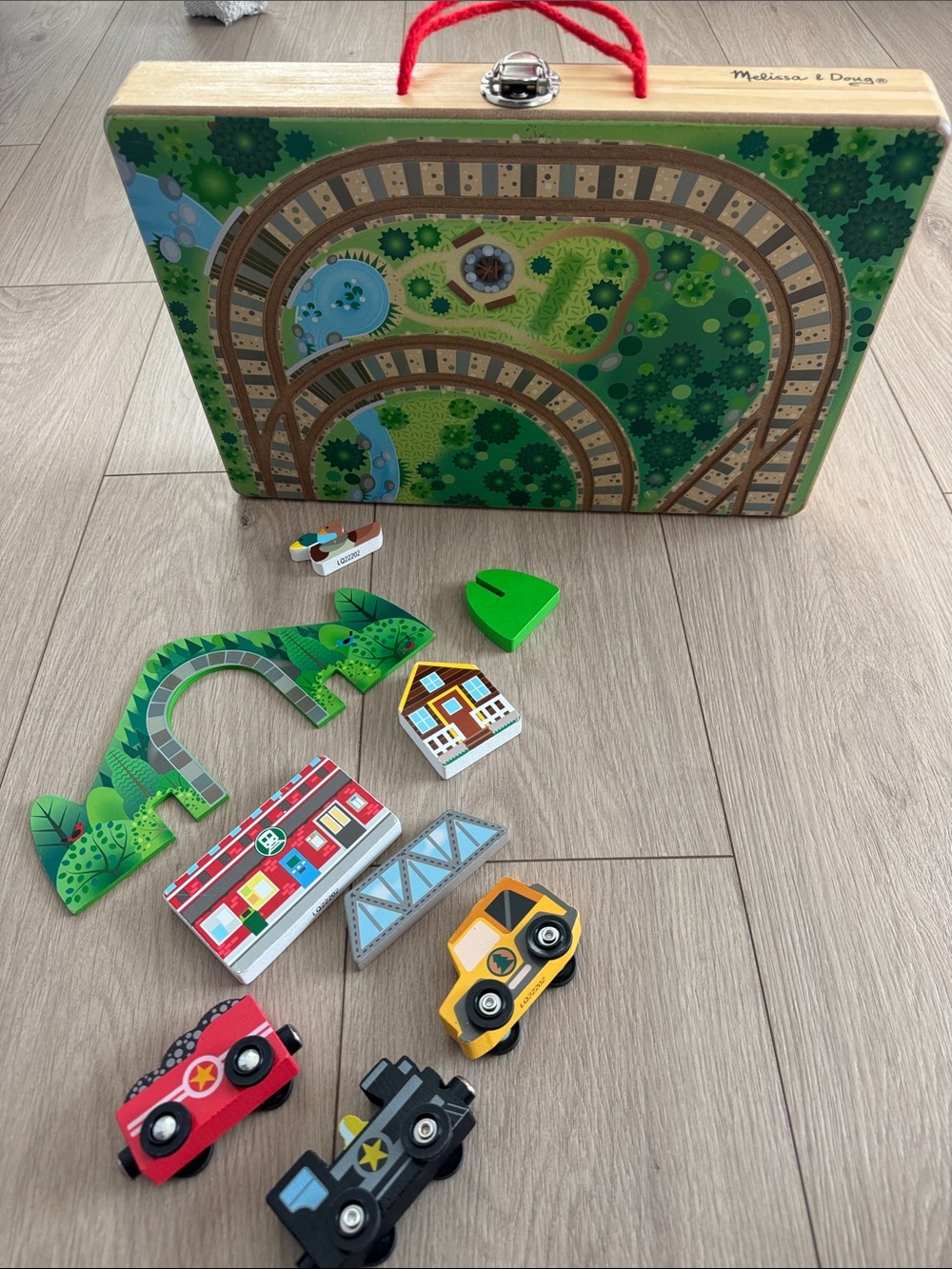 Melissa & Doug Wooden Train Play Case with Green, Red, Yellow, Black Vehicles